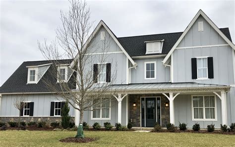 metal roof on brick colonial house|gray metal roof white house.